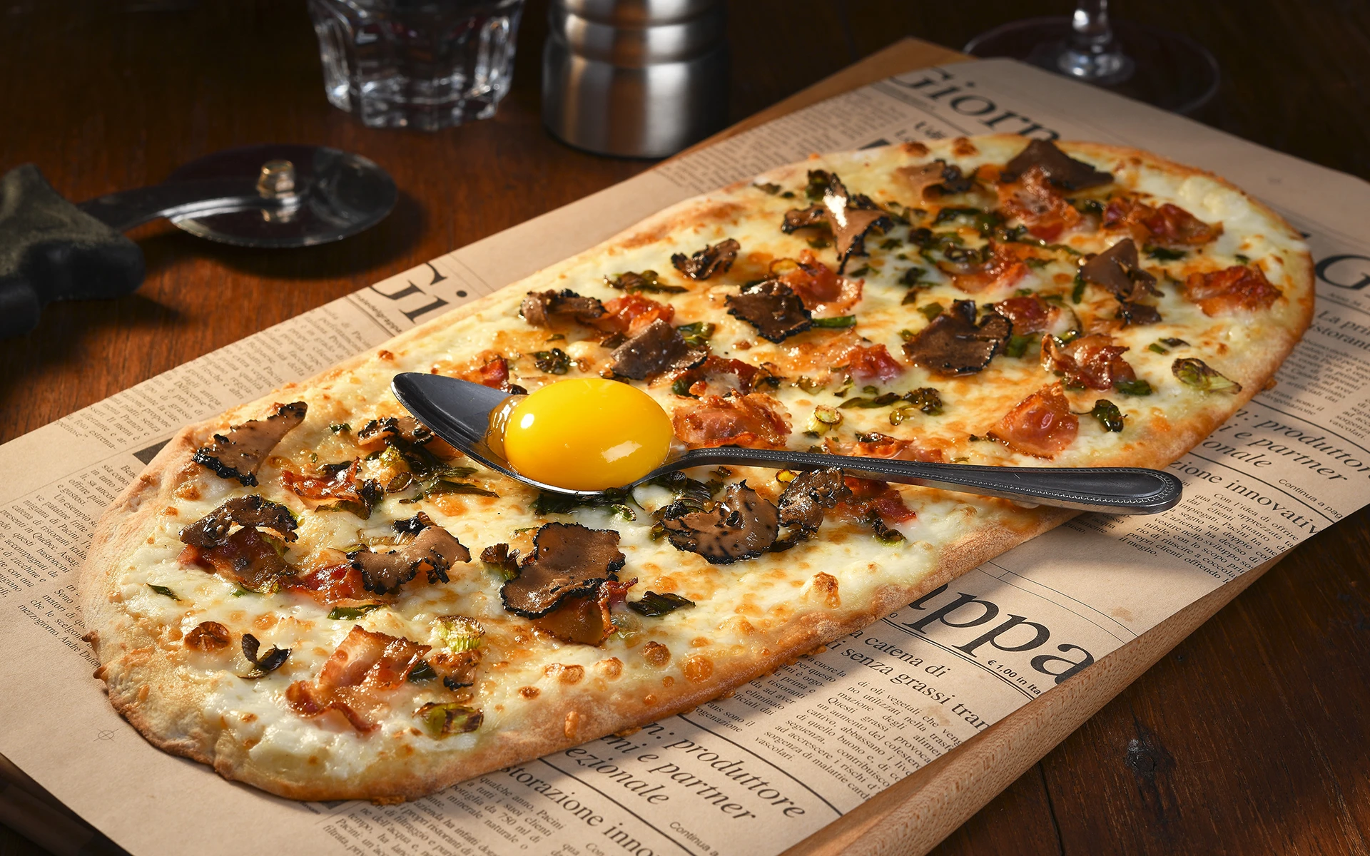 Truffle carbonara pizza served at Pacini