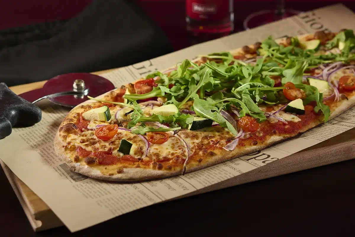 Pizza Primavera Pacini garnie de légumes frais et colorés