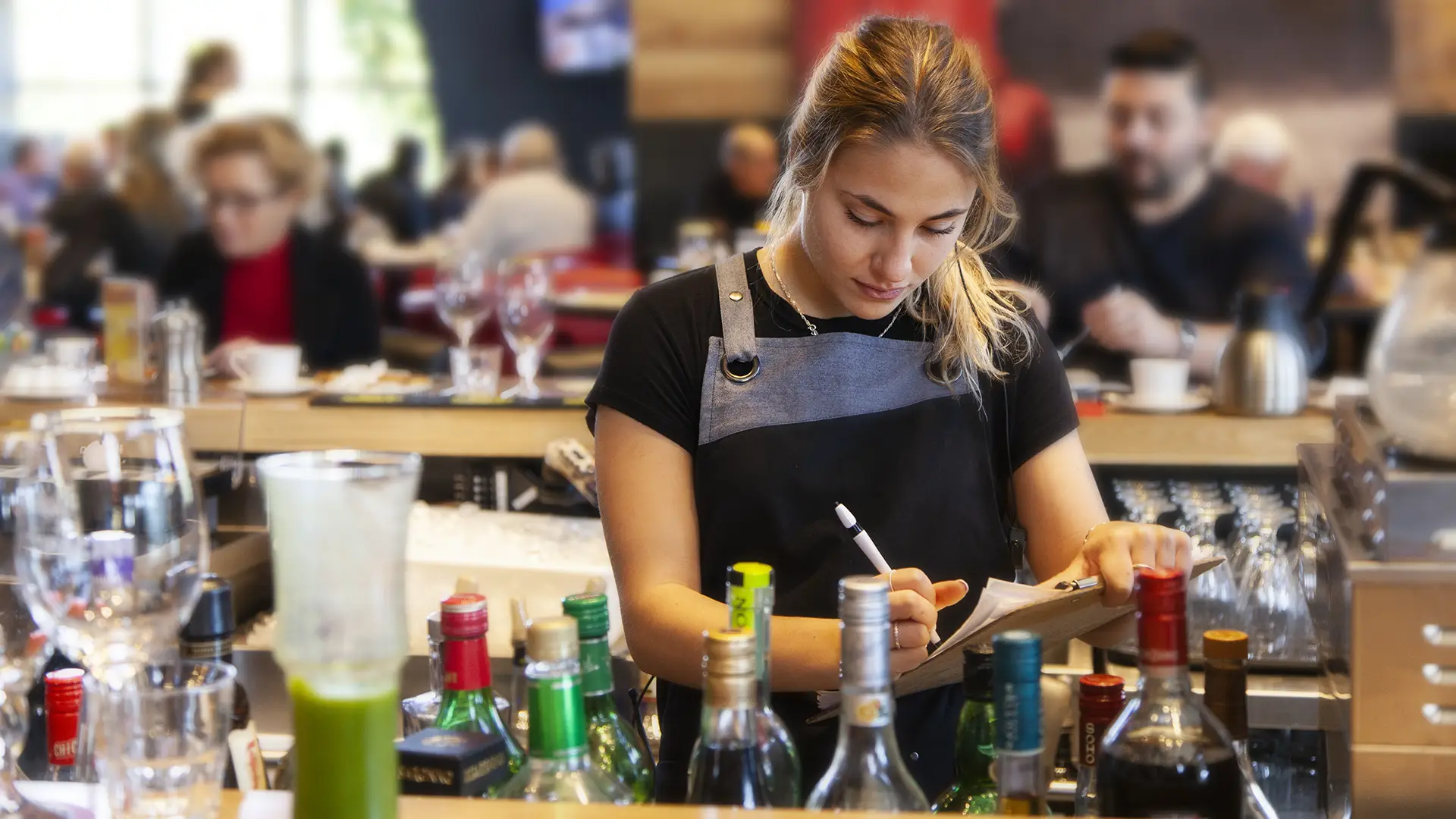 Pacini employee working at the bar